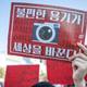 South Korean women protest against sexism and hidden camera pornography on August 4, 2018 in Seoul, South Korea. Over 40,000 women staged a protest to urge South Korean government to come up with measures to tackle sexual abuse involving hidden cameras.